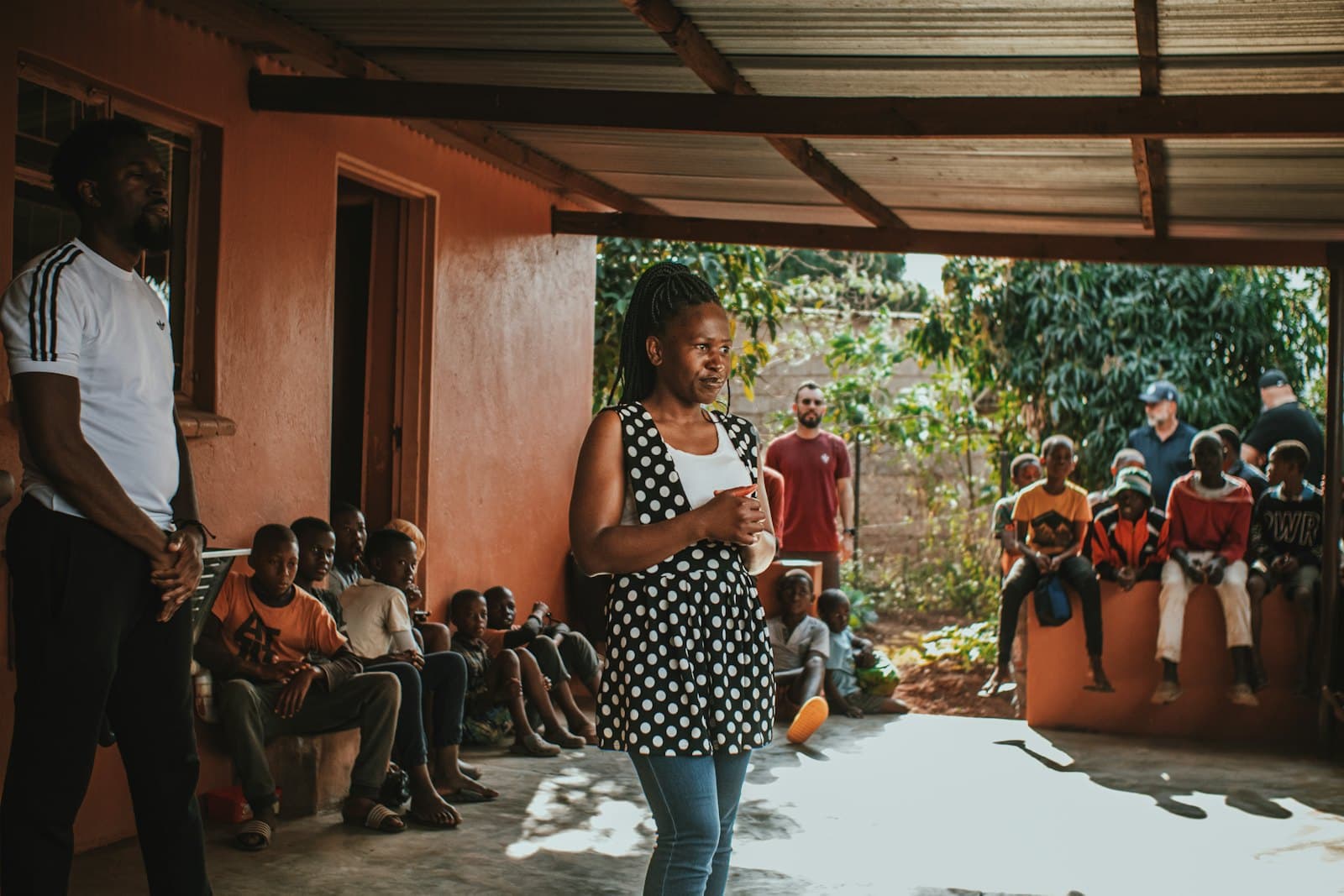 A lecturer speaking to a group of students